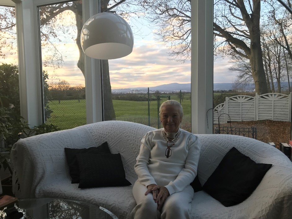 An interview with Mrs. Edeltraud Stegemann sitting in a white coach with beautiful view behind